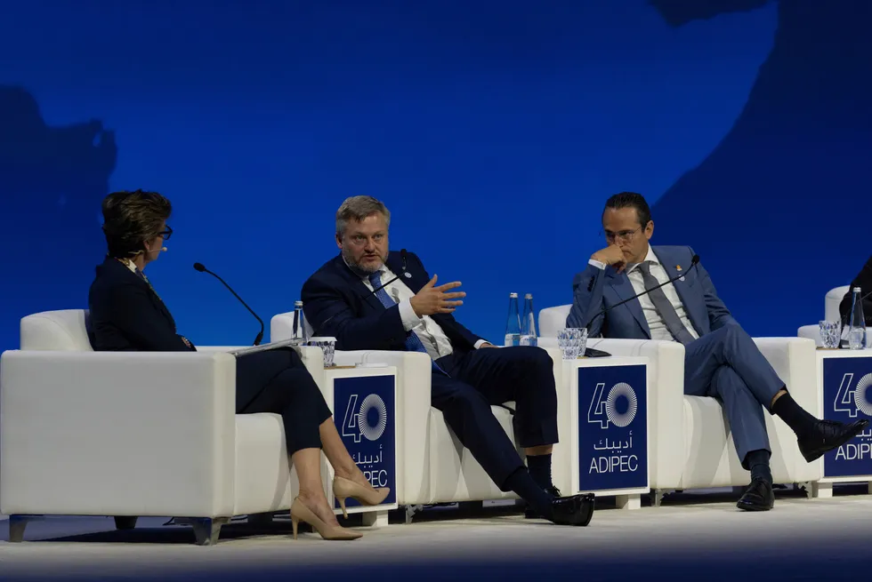 BP chief executive Murray Auchincloss (centre) talks in a panel during the Abu Dhabi International Petroleum Exhibition & Conference (ADIPEC) in Abu Dhabi, United Arab Emirates, Monday, 4 November 2024.