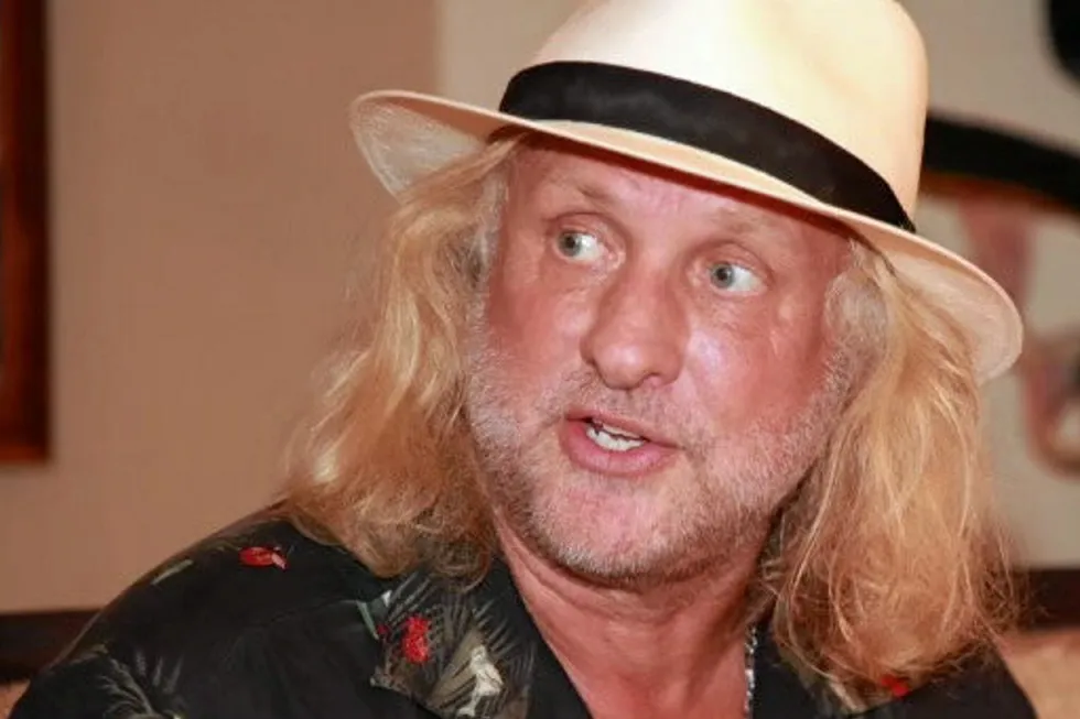 Rodger May, part owner of Peter Pan Seafood, has won a bid to buy his company's assets out of receivership.
