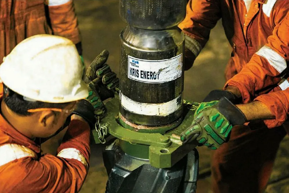 Working hard: KrisEnergy staff