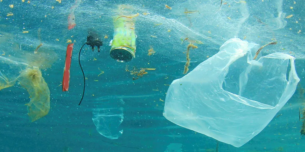 . plastic pollution floating in the sea.