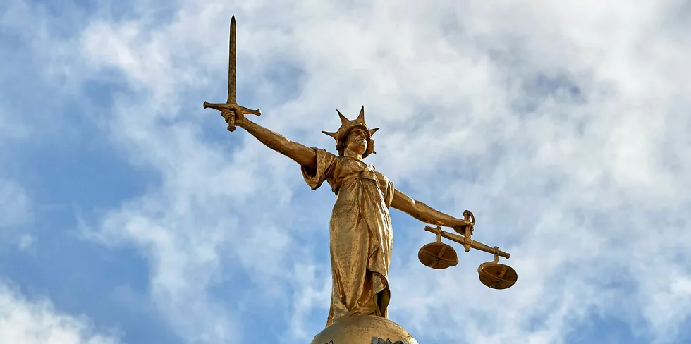The "Lady of Justice", a 12 foot high, gold leaf statue is pictured on top of the dome of the Central Criminal Court, commonly referred to as The Old Bailey in central London.