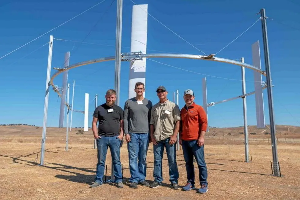 Members of the Airloom team with its experimental wind generation device.
