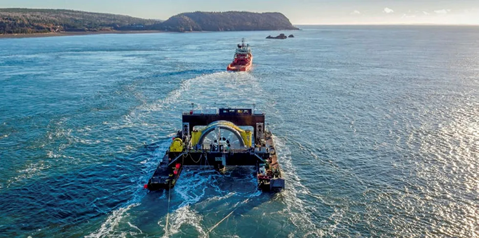 The OpenHydro tidal power unit is towed out for installation in Canada's Bay of Fundy in 2016