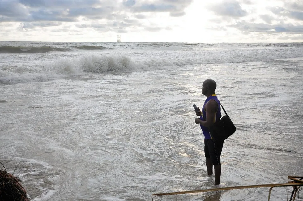 Surveying the scene: Ebiegberi Raynus, youth affairs coordinator at the Akassa Development Foundation and secretary general of the West African Sea Turtle Conservation, looks out to the jack-up Adriatic I that was leaking gas of Bayelsa State, Nigeria on 6 November