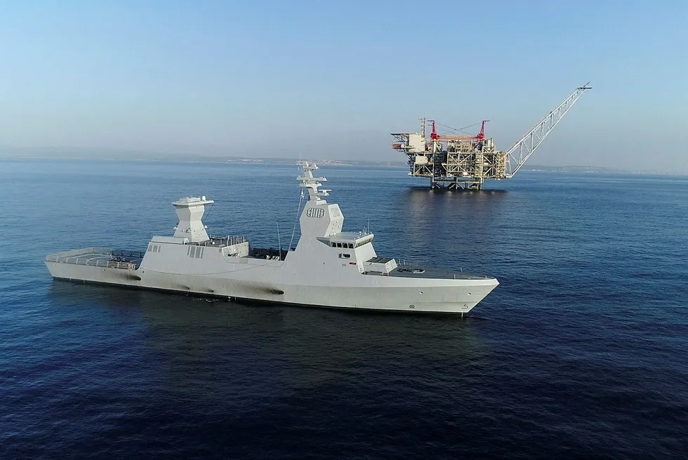 An Israeli naval vessel next to Chevron's Leviathan gas platform in 2020.