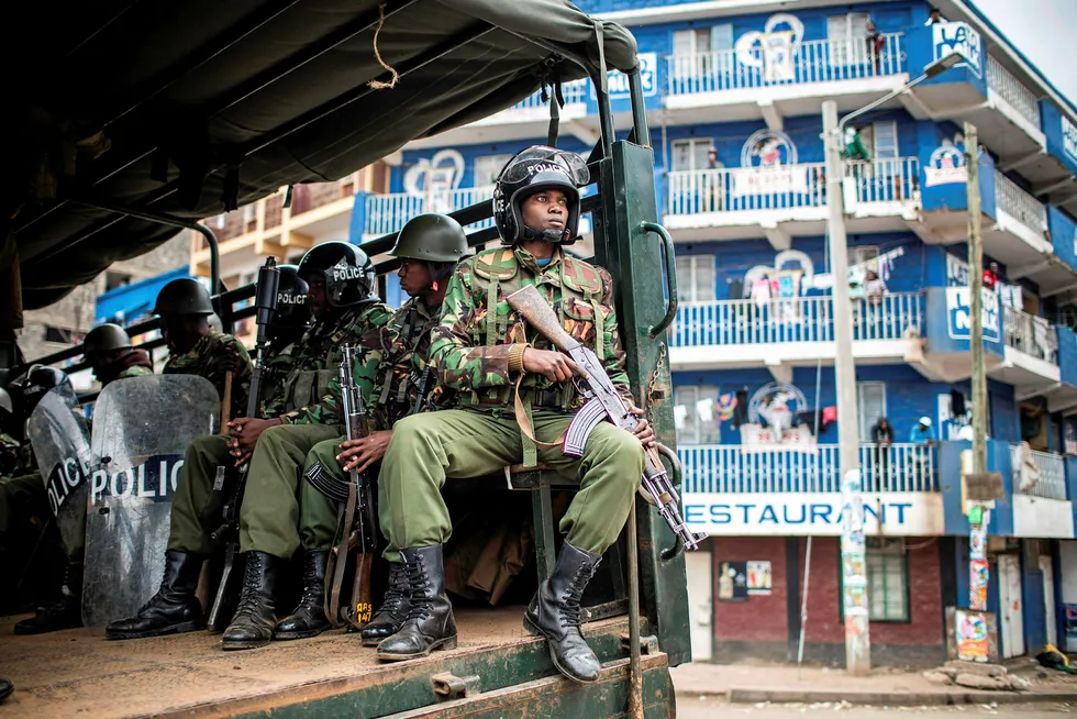 Tension: Kenyan police arrive to break up a protest by supporters of the Kenyan opposition presidential candidate Raila Odinga in Nairobi