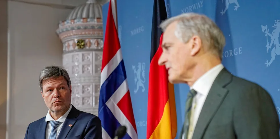 Norway´s Prime Minister Jonas Gahr Store (R) and German Minister of Economics and Climate Protection Robert Habeck.