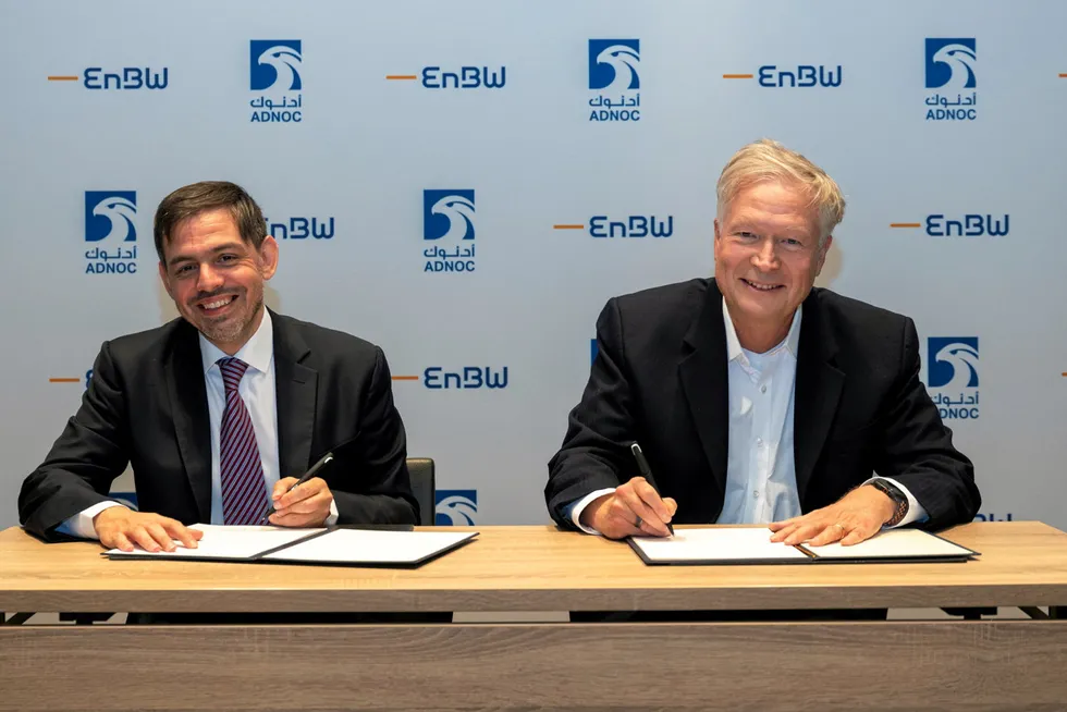 Adnoc and EnBW officials signing the 15-year sales and purchase agreement for 600,000 tonnes per annum of LNG.