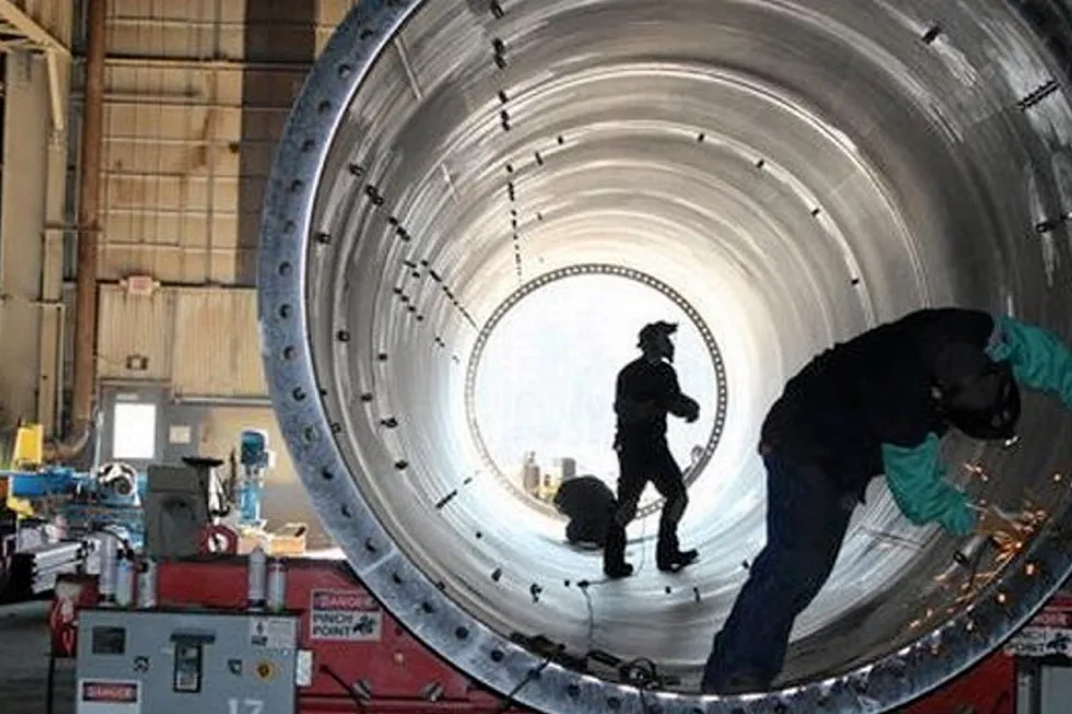 Workers at a Broadwind Energy wind tower US manufacturing plant