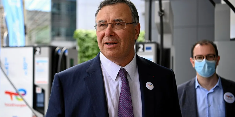 Total Chief Executive Officer Patrick Pouyanne looks on during the unveling ceremony of the new TotalEnergies logo, at La Defense on the outskirts of Paris on May 28, 2021. - Total shareholders voted on the strategy of the oil and gas giant, which renamed itself TotalEnergies to mark its diversification, while some investors are urging it to act more quickly. (Photo by Christophe ARCHAMBAULT / AFP)