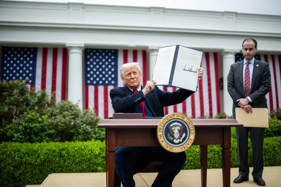 President Donald Trump signs an Executive Order on the Administration’s tariff plans at a “Make America Wealthy Again” event, Wednesday, April 2, 2025, in the White House Rose Garden.