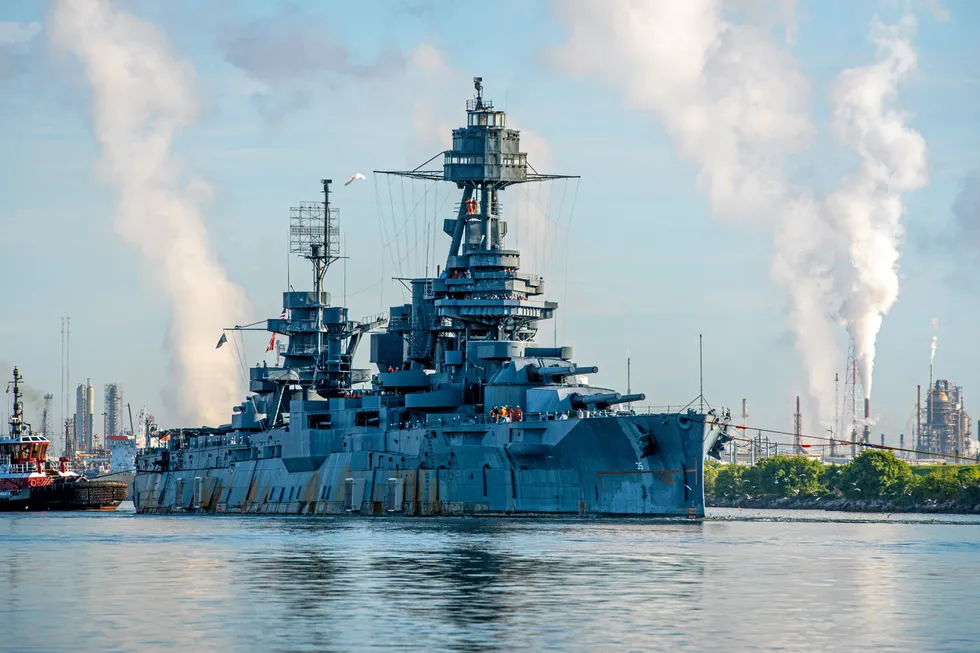 Relocation: Pilot boat crews tow the battleship USS Texas down the Houston Ship Channel near Baytown, Texas on 31 August