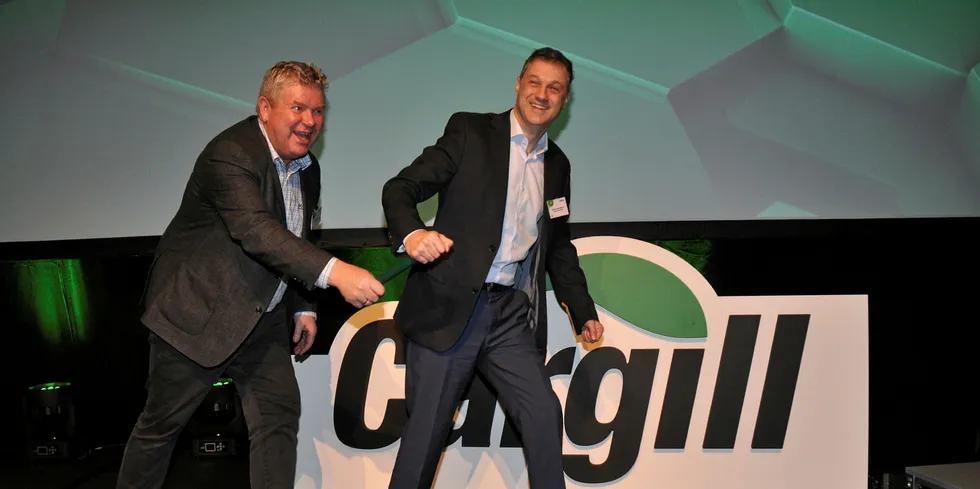 Einar Wathne hands the baton over to his successor Adriano Marcon.