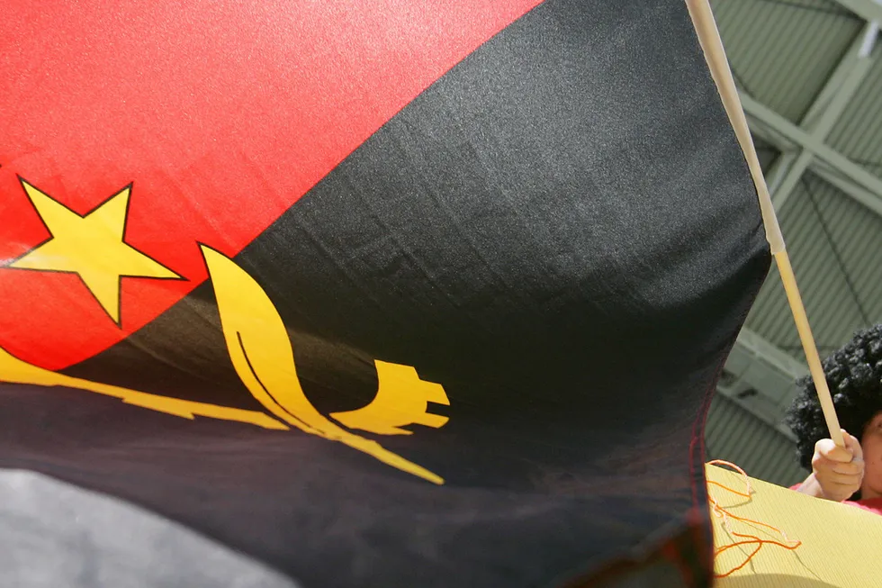 On the move: a child waves an Angolan flag prior the World Cup in 2006