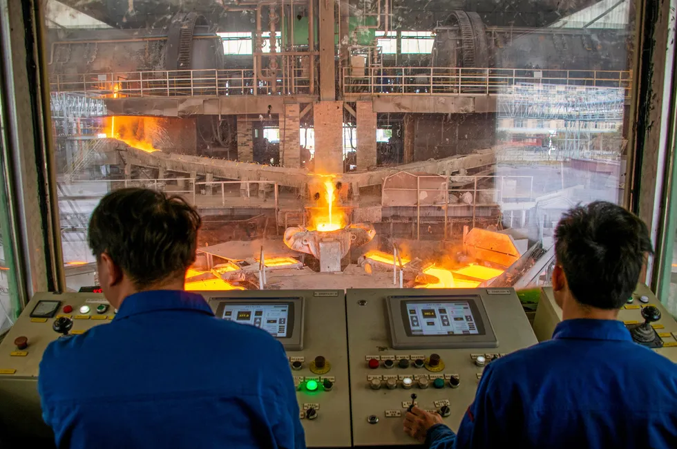 Molten copper flows into molds at a smelting plant in Wuzhou, Guangxi Zhuang Autonomous Region in China.