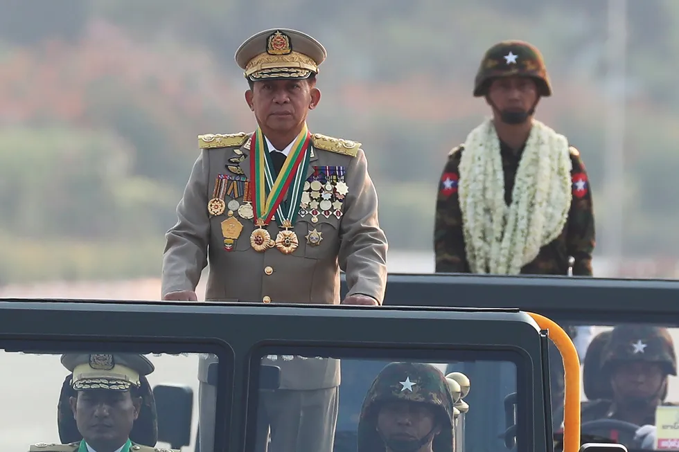 Myanmar military leader Senior Gen. Min Aung Hlaing, left, head of the military council, inspects officers during a parade to commemorate Myanmar's 78th Armed Forces Day in Naypyitaw, Myanmar, on March 27, 2023.