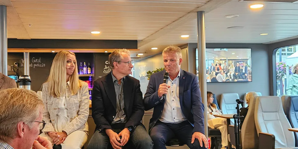 "We will clarify the tax in connection with the 2024 budget," Norway's Fisheries Minister Bjornar Skjaeran (right) told industry representatives at a conference in Arendal.