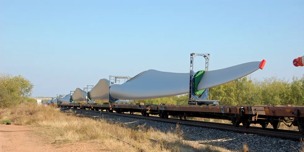 Train transporting wind turbine blades to a project in Texas.