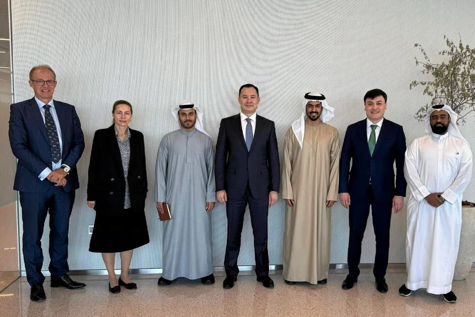 Kazakhstan's Qazaqgaz executive chairman Sanzhar Zharkeshov (centre) and Adnoc executive vice president for international growth Mohamed Al Aryani (third from right).