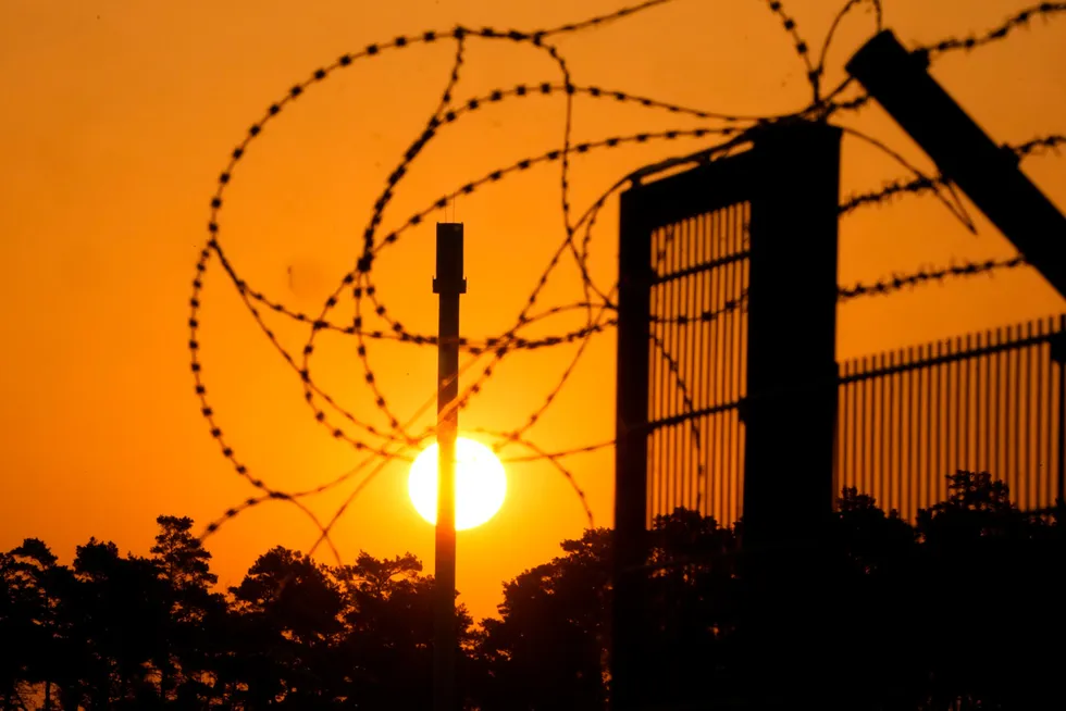 Energy security: barbed wire secures the entrance of the harbour that hosts the landfall of the Nord Stream 1 pipeline in Lubmin, Germany
