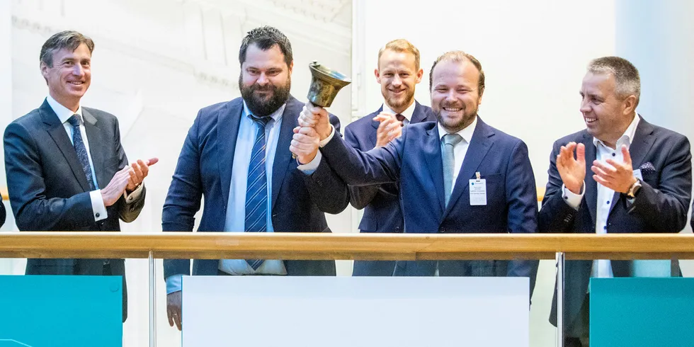 Stock Exchange Director Oivind Amundsen, far left, with the team from Salmon Evolution at their Oslo listing on Sept. 18.