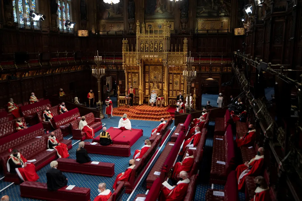 Duty: Queen Elizabeth II delivers her speech during the State Opening of Parliament in London on 11 May in a pared-back ceremony following the coronavirus pandemic and the death of her husband, the Duke of Edinburgh, in April