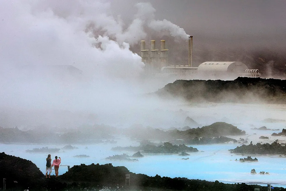 Deep resource: Visitors take pictures of the Svartsengi geothermal power plant near the Blue Lagoon hot springs outside the town of Grindavik, Iceland.