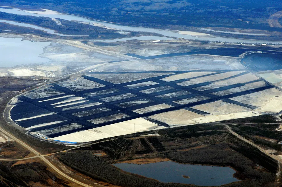 Low-carbon drive: a Suncor tar sands mining operation is shown in this aerial photo north of Fort McMurray, Alberta in 2011