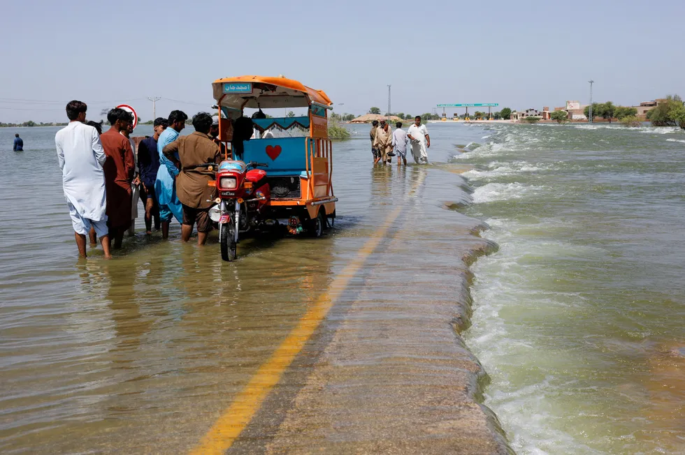 Disruption: caused by torrential rain and flooding on a highway in Pakistan.