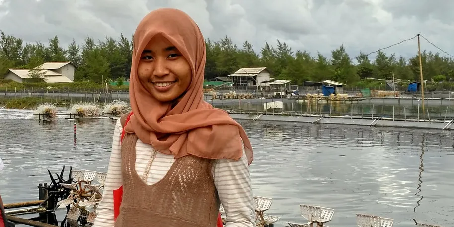 Jala CEO Liris Maduningtyas on an Indonesian shrimp farm. The shrimp tech company is one of Conservation International Ventures' investments.