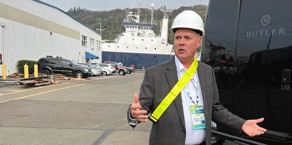 Allen Kimball leading particpants at GOAL 2022 on a tour of Trident vessels in Tacoma where an omega-3 processing vessel is also stationed.