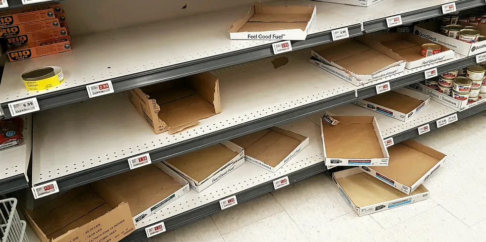 Empty shelves once housing canned tuna.
