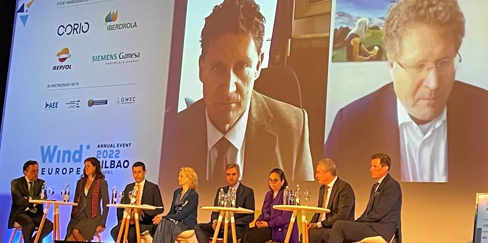 Eamon Ryan (on screen, left) speaking at the opening session of WindEurope 2022.