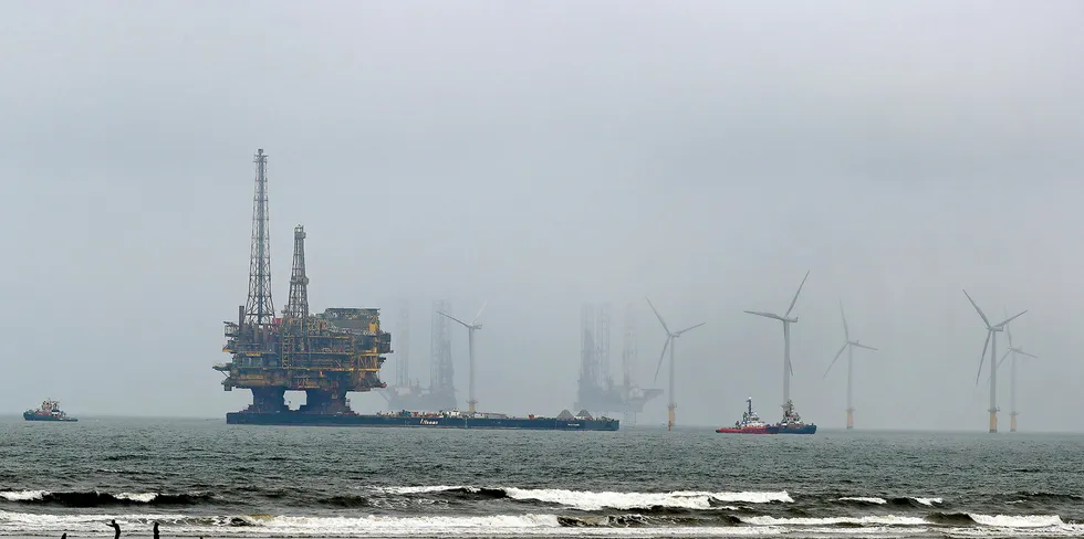Shell's Brent Delta drilling rig being towed in for decommissioning in 2017