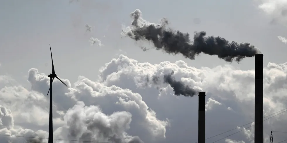 A coal plant beside a wind turbine in Gelsenkirchen, western Germany.