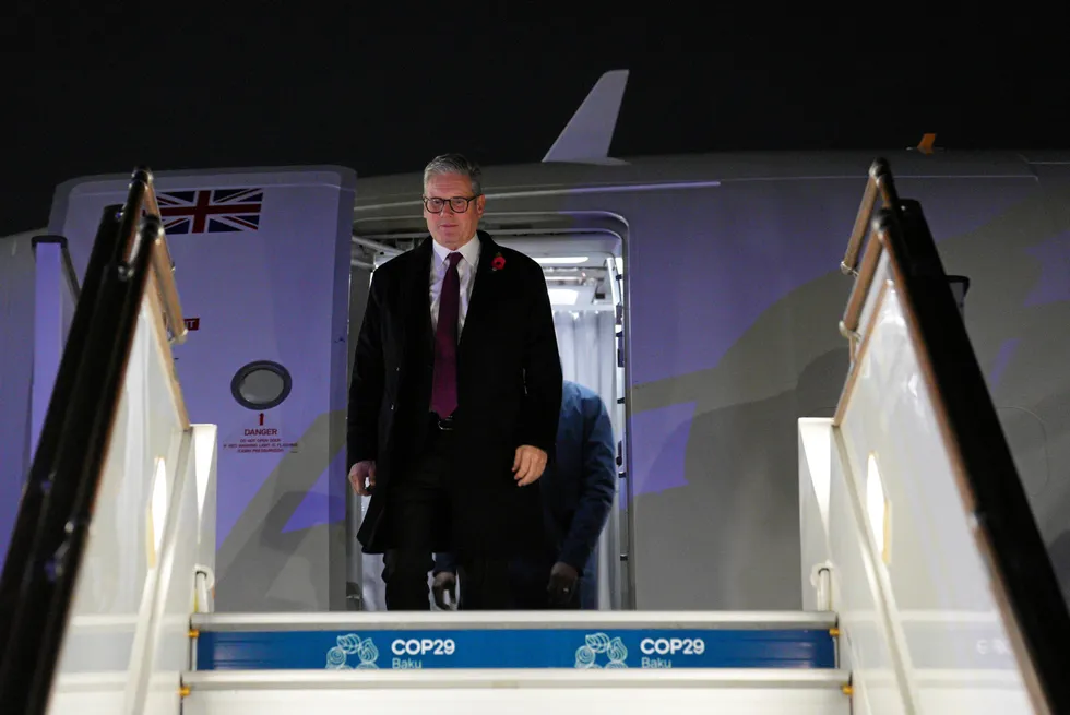 Britain's Prime Minister, Keir Starmer arrives at Heydar Aliyev International Airport to attend the UNFCCC COP29 Climate Conference, on November 11, 2024 in Baku, Azerbaijan.