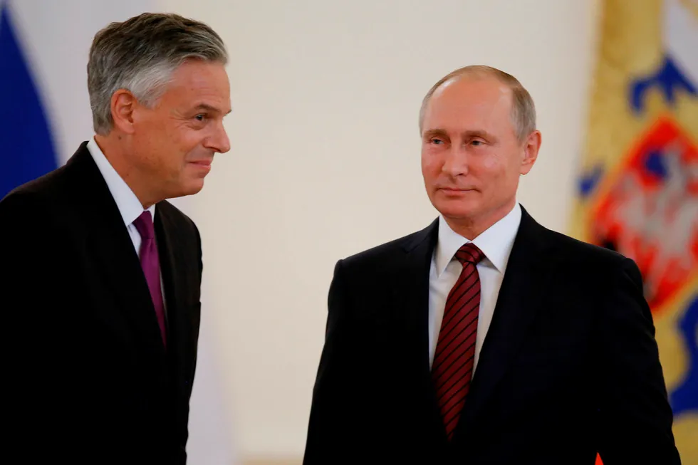 Appointment: Huntsman, left, with Russian President Vladimir Putin