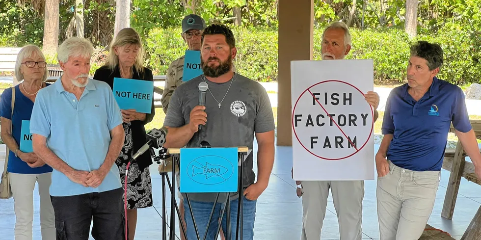 Opponents on June 13 protest the EPA permitting Ocean Era in Florida.