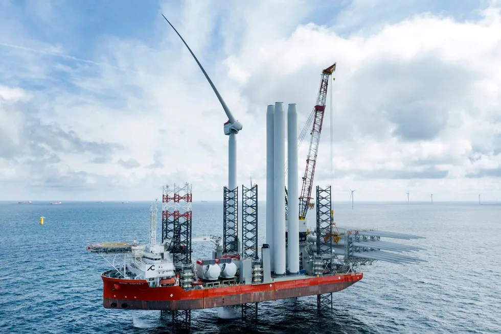A Cadeler jack-up vessel installing an offshore wind turbine.