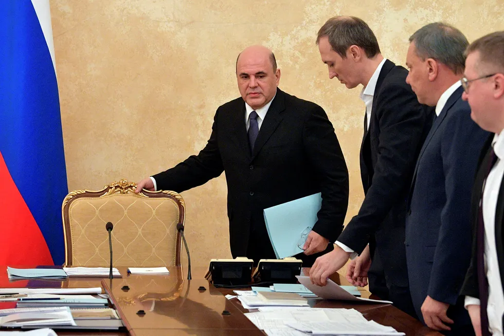 Quick approval: Russian Prime Minister Mikhail Mishustin (left) arrives to lead a cabinet meeting in Moscow earlier this week