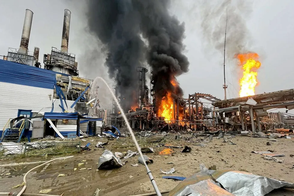 Chilling view: firefighters cooling the site of a major fire at the Gazprom-operated condensate processing facility in the Yamal-Nenets region in Russia