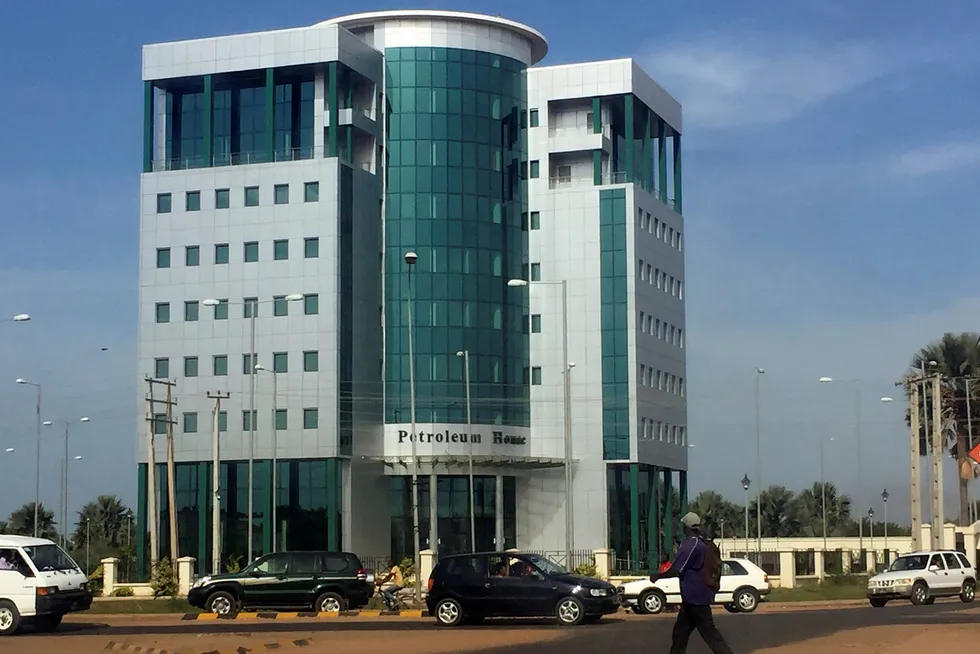 Extra time: Gambia's tallest building, Petroleum House, houses the oil ministry at a crossroads in Banjul