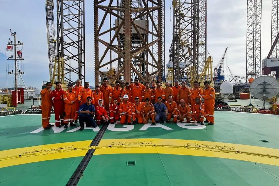Happier days: workers on Velesto Energy’s jack-up Naga 6.
