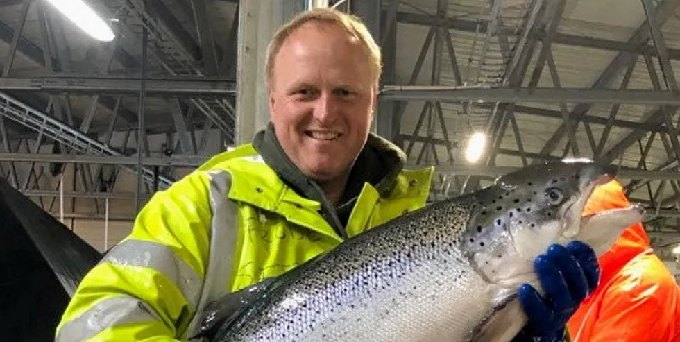 Frode Saetre, operations manager at Profunda, with an AquaGen salmon.