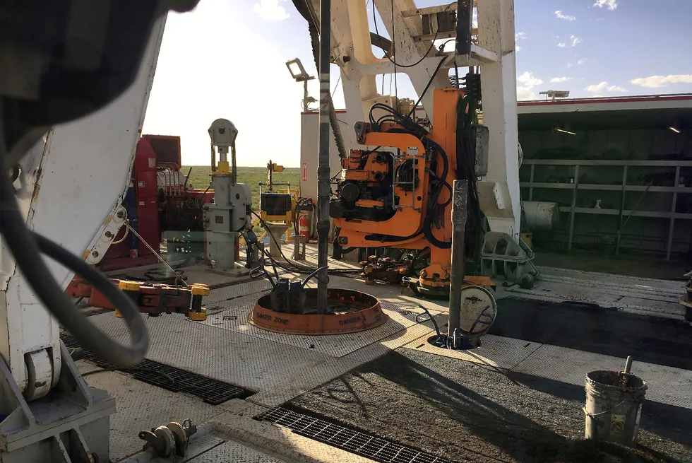 Focus for players: a drilling rig in the Permian basin in Texas