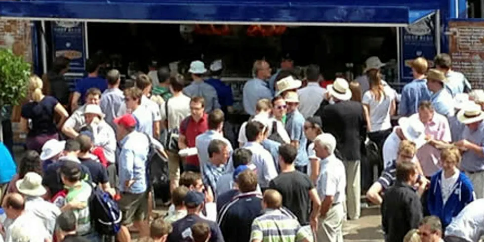 Crowds flock to grab a portion of traditional UK fish n' chips as temperatures get set to rise over the Easter weekend.