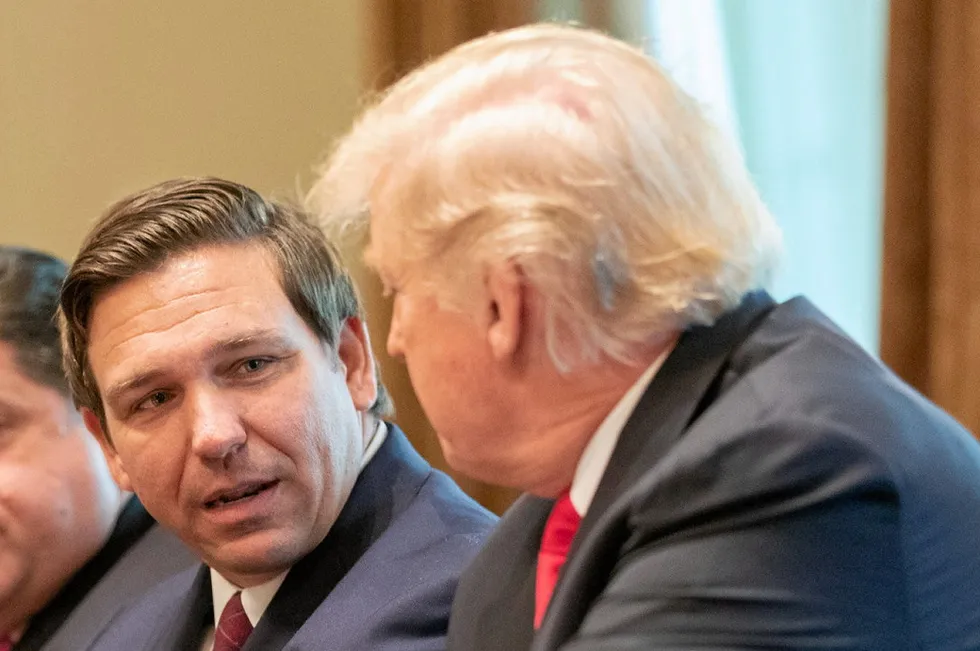 Donald Trump (right) and Ron DeSantis.