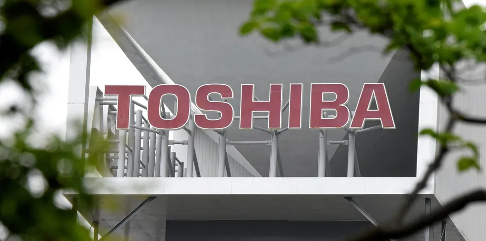 The logo of conglomerate Toshiba is seen at the headquarters in Tokyo.