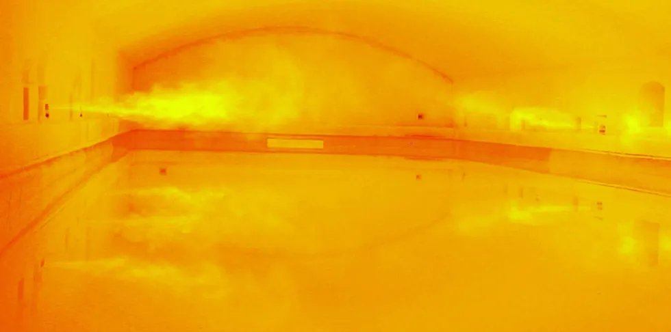Inside an industrial glass furnace, which today use natural gas (and often pure oxygen) to reach the high temperatures required.