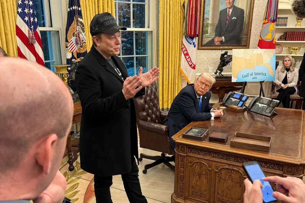 Tesla CEO Elon Musk discusses the Department of Government Efficiency in the Oval Office with US President Donald Trump.